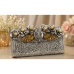 Royal Silver Floral Embossed Clutch Bag with Peacock & Ganesha Motif