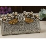 Royal Silver Floral Embossed Clutch Bag with Peacock & Ganesha Motif - Image 2