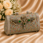 Luxury Handcrafted Silver Floral Clutch with Emerald Stone Embellishments