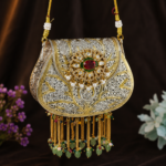 Royal Heritage Silver Filigree Potli Purse with Ruby Accent & Pearl Tassels - Image 2